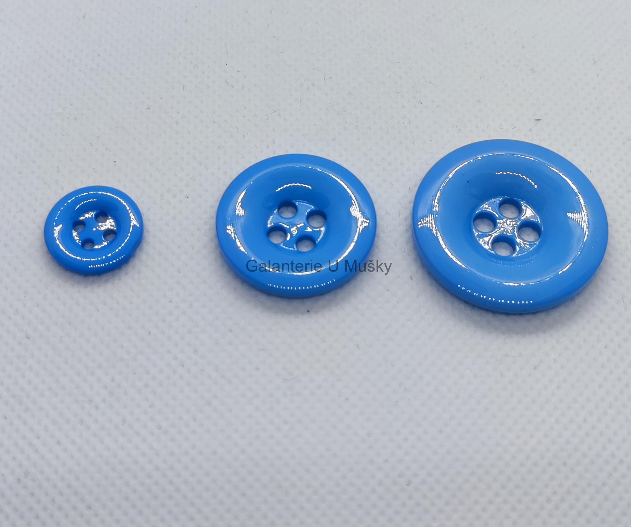 Knoflík sv. modrý 24"